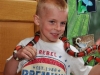 Boy holding milk snake