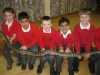Carpet python being held by brave children